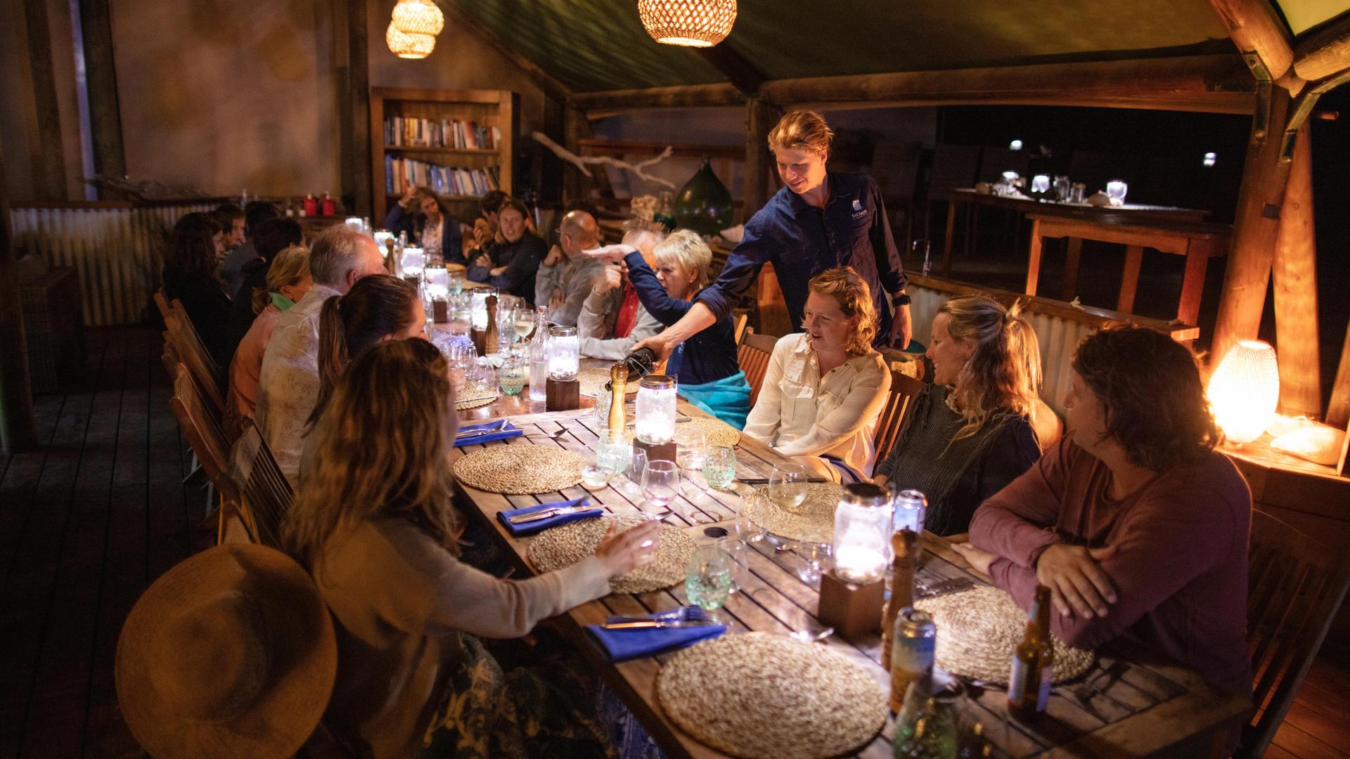 group of people enjoying dinner